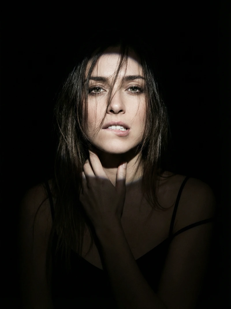 Dark Spotlight Female Portrait, created using a Nano Banana Prompt